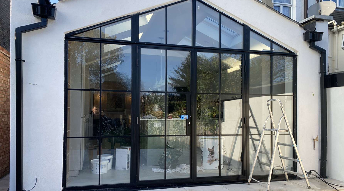 Residential bi-fold opening to deck